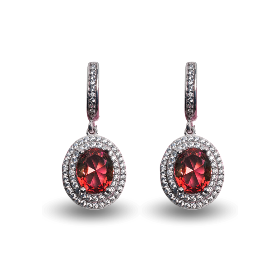 Earrings with round Zultanite stones and a double zircon halo.